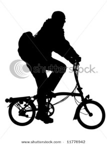 Man riding modern foldable bicycle.